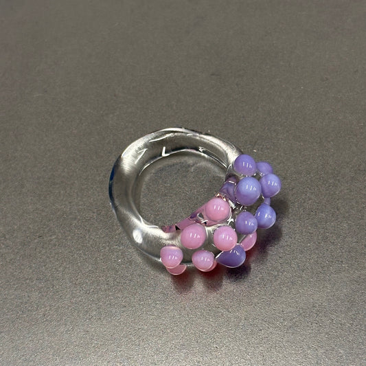 Anillo bolitas rosa y morado