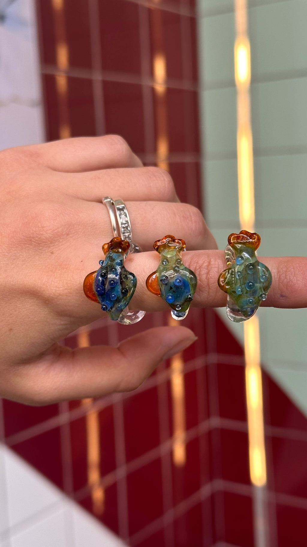Anillo pez verde azulado