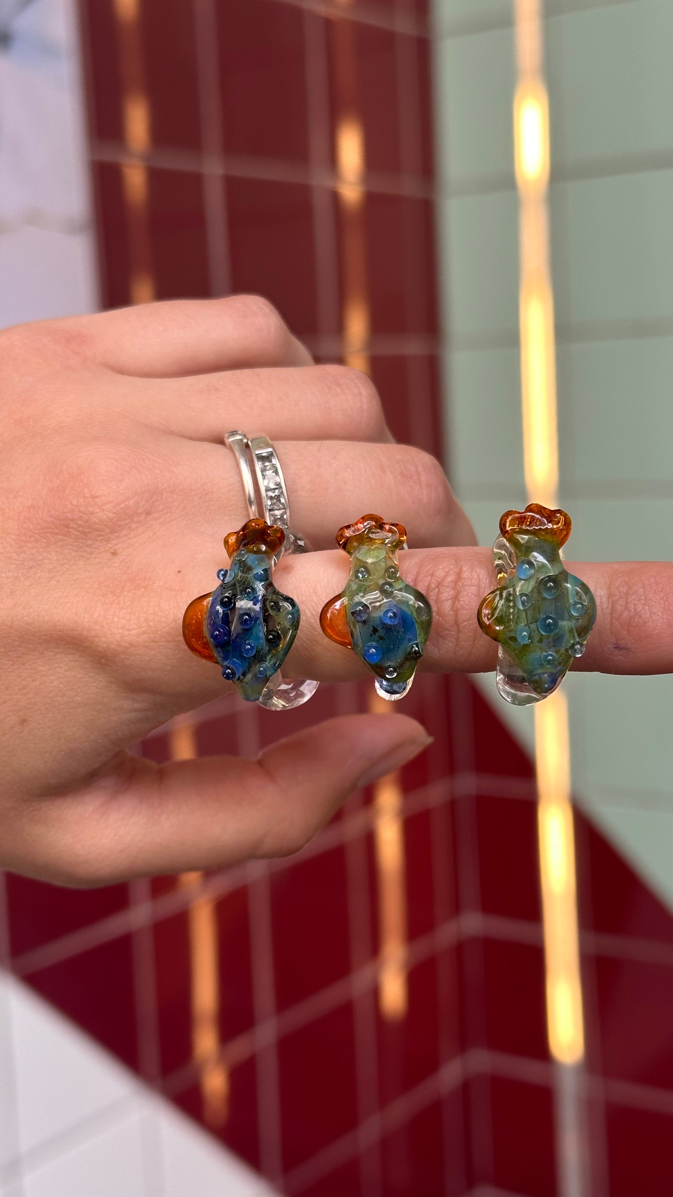 Anillo pez verde azulado